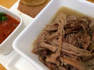 Borrego al horno con salsa de xoconostle